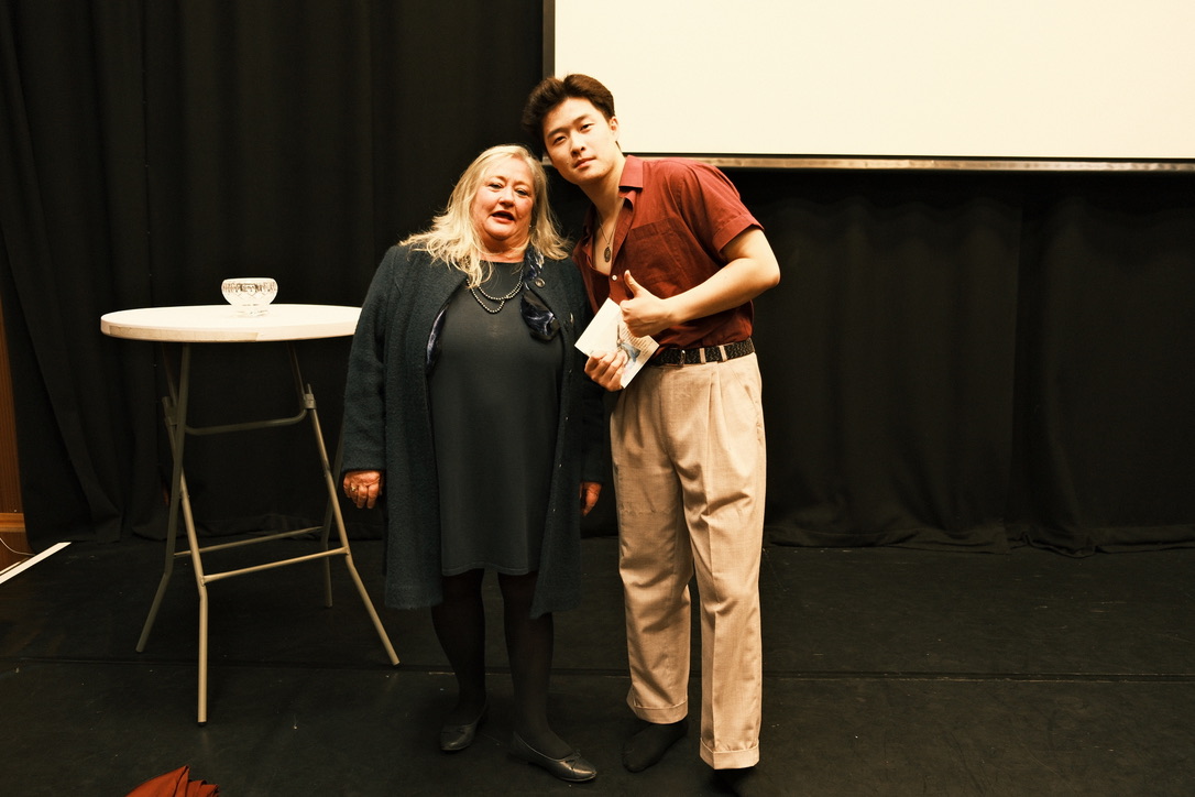 Zhenhao Wen with a member of the Elegies creative team after the show