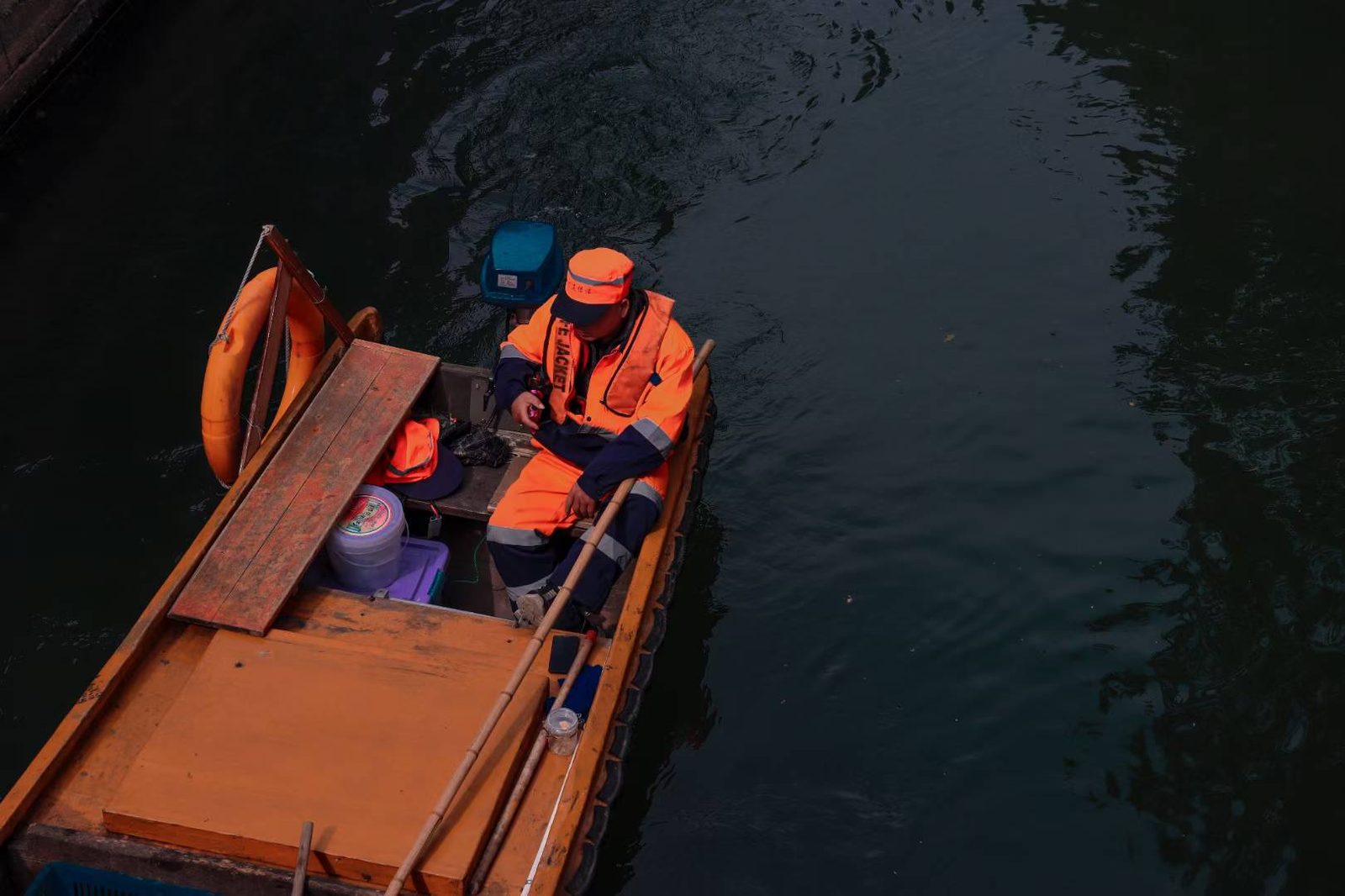 River worker on boat