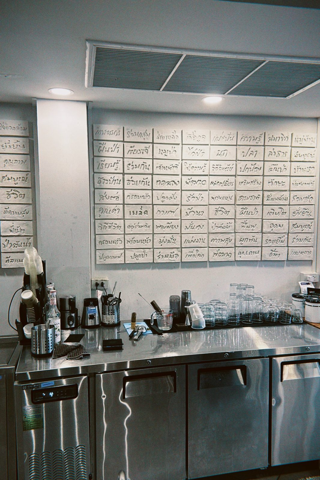 Cafe Thai script wall