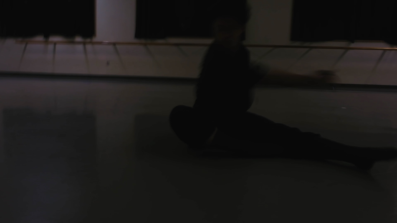 Motion-blurred still from Bodies Left Out