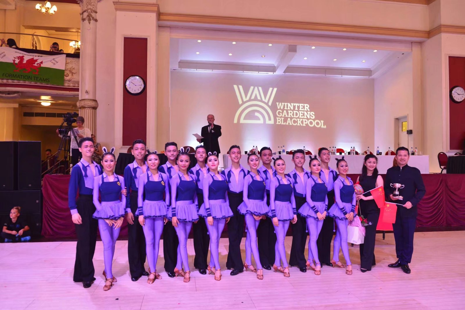 The Beijing Baihui formation team with their trophy at the Winter Gardens, Blackpool